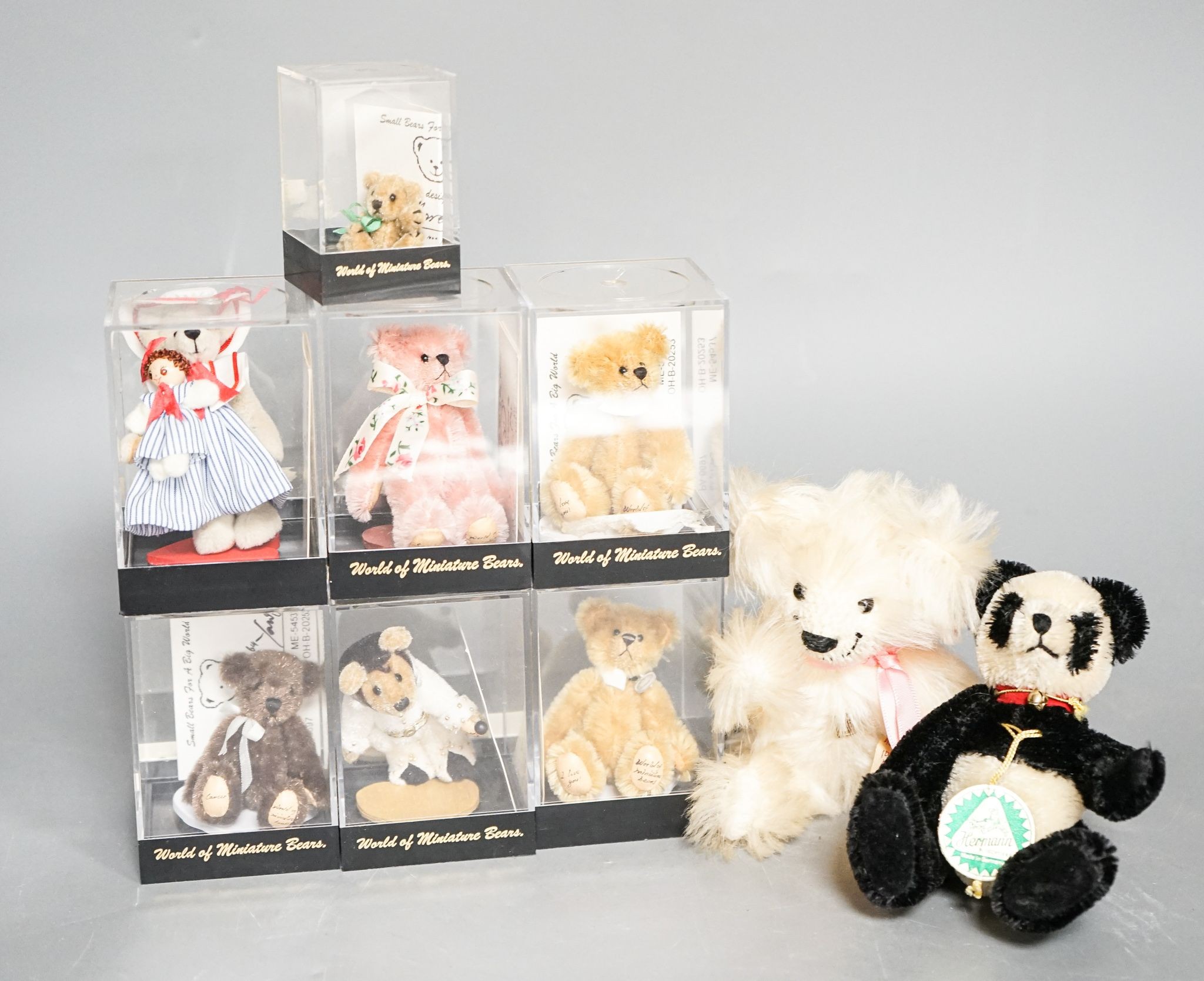 Seven World of Miniature Bears and one Grisley and one Herman